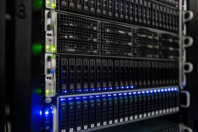 Racks of servers in a data centre, the kind of remote machines cloud files are kept on.