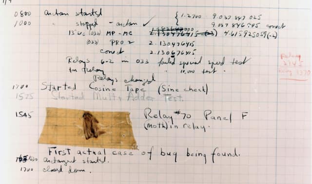 A 1947 computer logbook page with a real moth taped to it, labelled: First actual case of bug being found.
